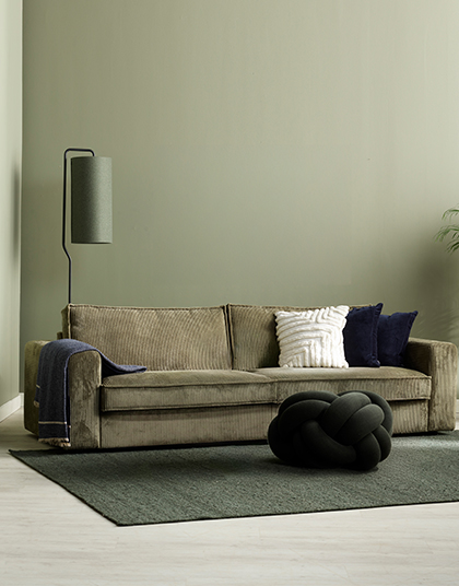 Grön soffa i manchestertyg