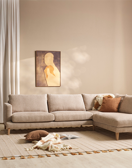 Beige soffa med öppet avslut