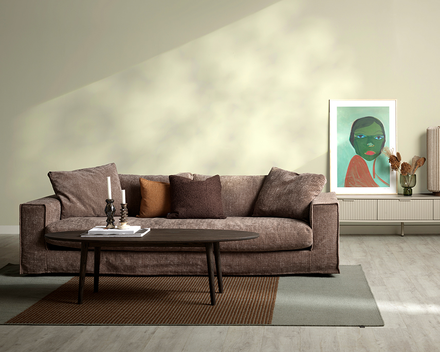 Lila soffa med en sits