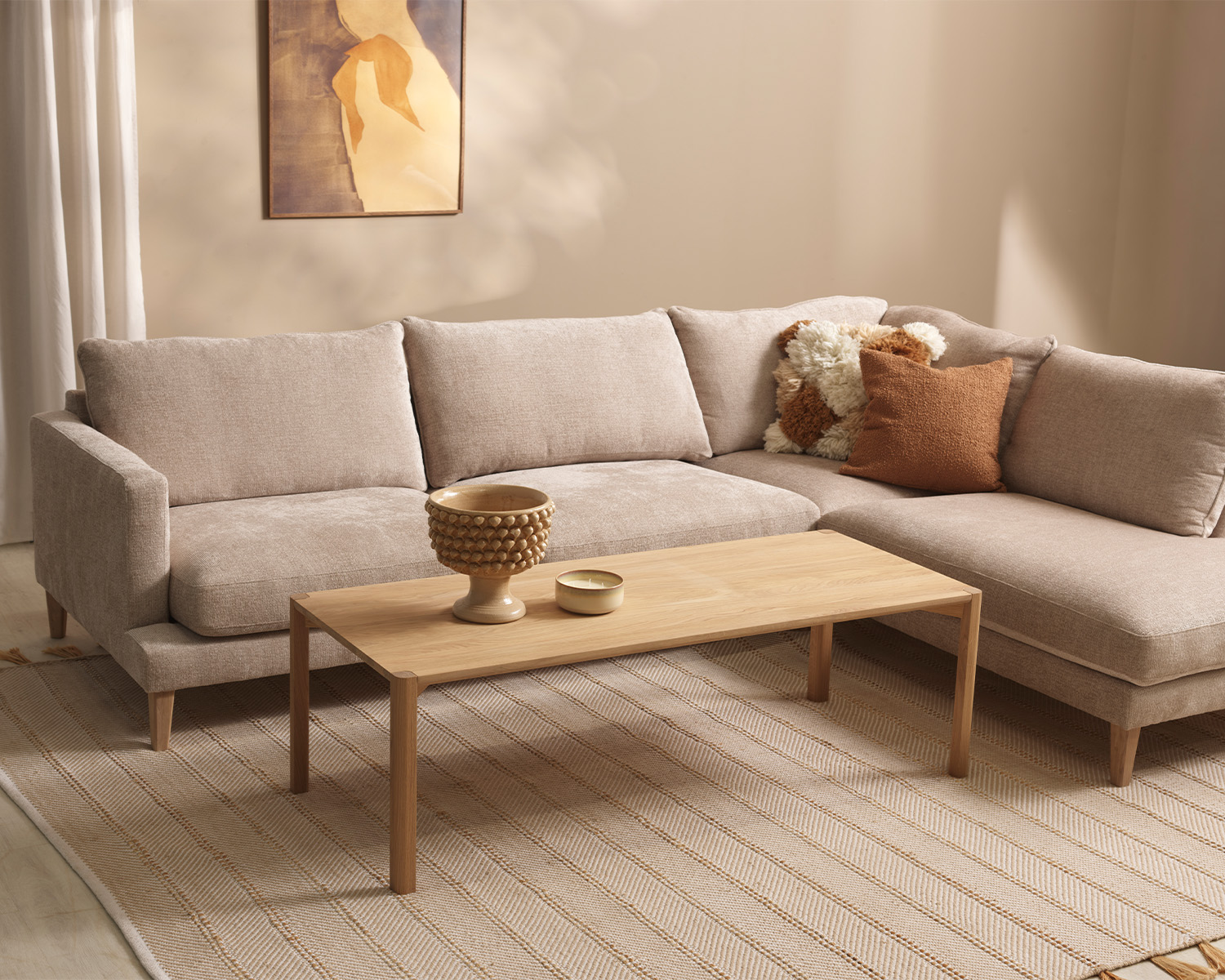 Beige soffa med öppet avslut